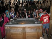 The flatmates around the new hot tub