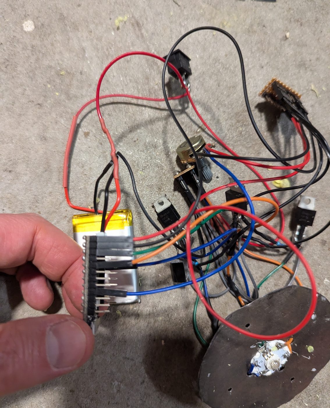 Qduino Mini and LiPo battery wired to the 3W LED on its round heat sink