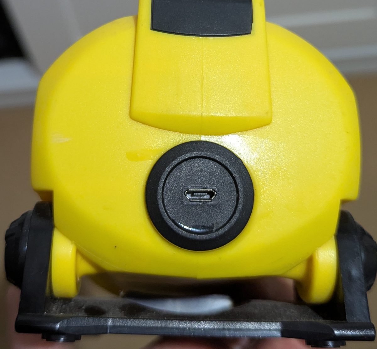 Micro USB charging port fitted to the back of the yellow Arduino torch